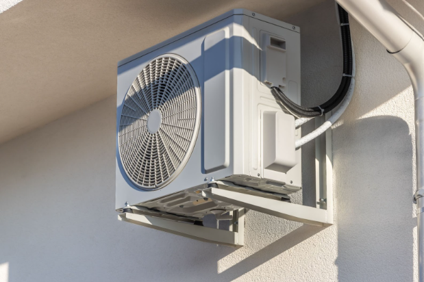 Air source heat pumps installation in Alexandria, VA under a roof modern family house under construction.